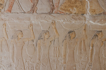 Ancient Egyptian fresco in a tomb at the Saqqara Necropolis.