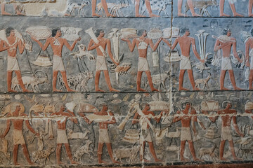Ancient Egyptian fresco in a tomb at the Saqqara Necropolis. - obrazy, fototapety, plakaty
