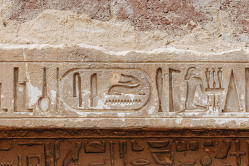 Egyptian hieroglyphs at the Saqqara Necropolis in Egypt.