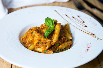 Pasta bolognese. The traditional bolognese sauce recipe contains only a few ingredients: minced meat, onion, garlic, tomatoes and wine