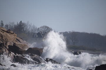 Ocean waves crashing against a rocky shore