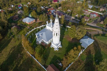 Ancient Savior Transfiguration Cathedral with a bell tower on a sunny September day (shooting from a quadcopter). Sudislavl, Kostroma region. Russia