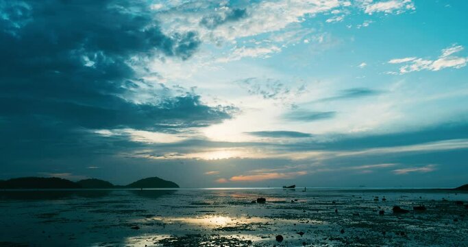 Beautiful sunrise over island. Timelaps sun up morning landscape view.