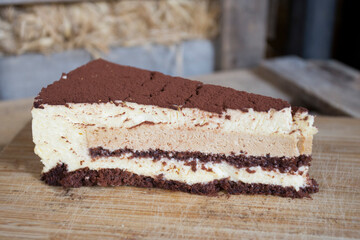 Italian tiramisu. Tiramisu is a cold cake that is assembled in layers. and has ingredients like cocoa, mascarpone and coffee.