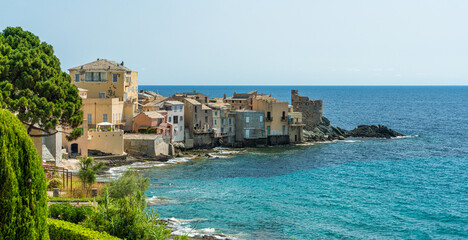 Obraz na płótnie Canvas The picturesque village of Erbalunga on a summer morning, in Cap Corse, Corsica, France.