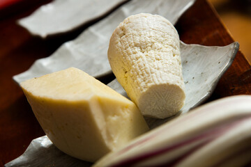Neapolitan pizza with guanciale, pecorino and radicchio. Classic Italian recipe. Guanciale is an Italian non-smoked cured meat prepared with pork cheeks or cheeks.