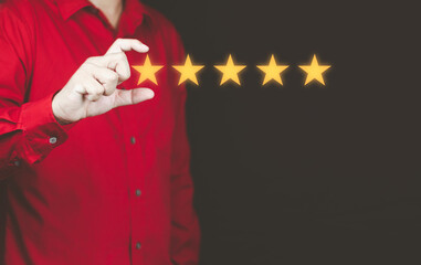 Customer service and Satisfaction concept Men's hands doing online assessments in the satisfaction rating the popular service company allows customers in order to improve and develop the organization