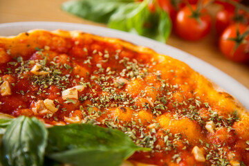 Pizza with vegetables. Neapolitan pizza made with baked vegetables. Italian vegetarian recipe.