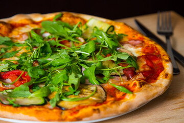 Pizza with vegetables. Neapolitan pizza made with baked vegetables. Italian vegetarian recipe.