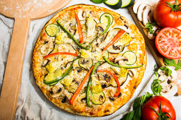 Pizza with vegetables. Neapolitan pizza made with baked vegetables. Italian vegetarian recipe.