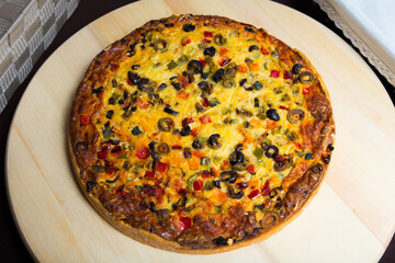 Pizza with vegetables. Neapolitan pizza made with baked vegetables. Italian vegetarian recipe.