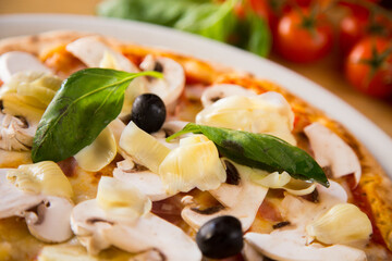 Mushroom Pizza. Neapolitan pizza with tomato sauce, cheese, ham and mushrooms. Authentic Italian recipe.