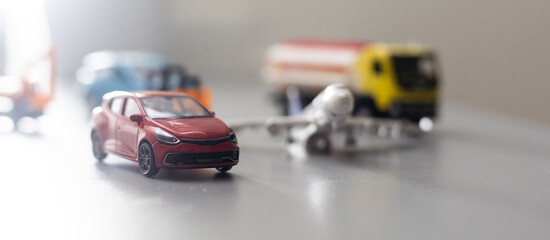 Travel concept. Toy model of car and airplane.
