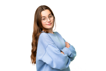 Teenager girl over isolated chroma key background with arms crossed and looking forward