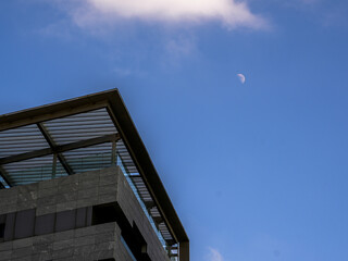 urban style builiding view with ablue sky and moon at abdali area at amman- jordan