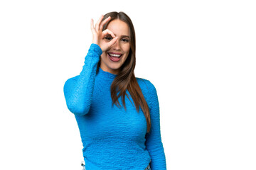 Young beautiful woman over isolated chroma key background showing ok sign with fingers