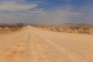 Namibian landscape along the gravel road. Damaraland, homelands in South West Africa, Namibia. - 557736773