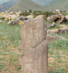 Historical stone sculptures near Old Burana tower that depict various figures and scenes from Kyrgyz history and culture. These sculptures provide insight into country's rich history and traditions