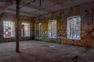 Old abandoned haunted red brick factory of stockings, pantyhose and socks in Central Europe, Poland