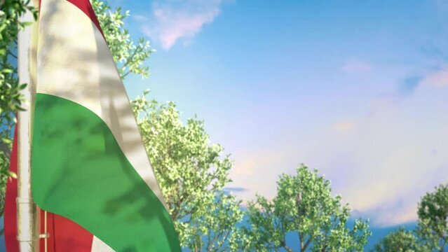 Waving flag of Hungary on forest and blue sky background
