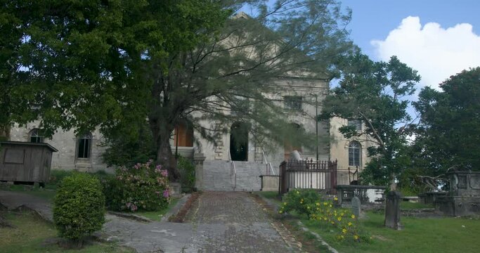 Antigua St Johns Caribbean St Johns Cathedral cemetery. Church of Diocese North Eastern Caribbean and Aruba. Anglican Church of England. Originally built 1683. Seventy foot twin towers.