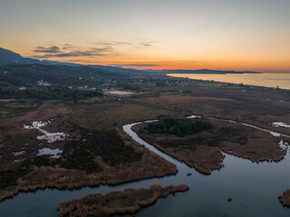 Aerial drone view of  Antinioti Lake by sunset  in north Corfu Island, Greece