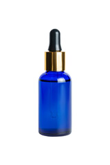 Blue glass bottle dropper with gold lid isolated on white background by clipping path. Skin care madicine and cosmetology mockup.