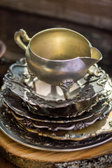 Vintage silver tableware on table