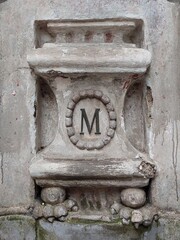 Fragment of an old stone column in Medieval style, Italy