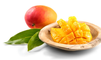 Mango fruit. Ripe Mango fruits isolated on white background. Close-up of fresh juicy tropical mango with leaf, ready to eat healthy sweet dessert, vegan food