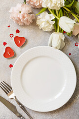 Menu Valentine's Day and beautiful spring flowers. Valentine's day, Womans day, wedding or mothers day. View from above.