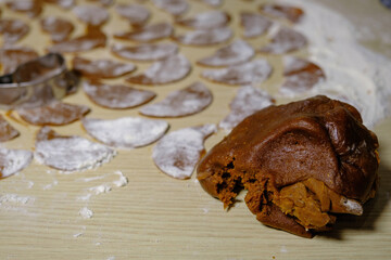 Rolled dough for making cookies cut into molds.