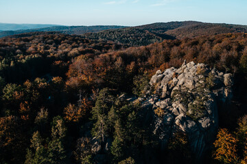 View of the Dovbush rocks from the mountain, a beautiful autumn landscape and a view of the Ukrainian nature reserve of the Dovbush rocks.