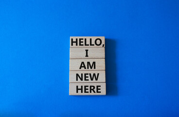 Hello I am new here symbol. Concept words Hello I am new here on wooden blocks. Beautiful white background. Business and Hello I am new here concept. Copy space.