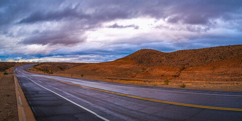 Dramatic stormy cloudscape over the road in the desert valley in Bullhead, in Bullhead City, Arizona, USA