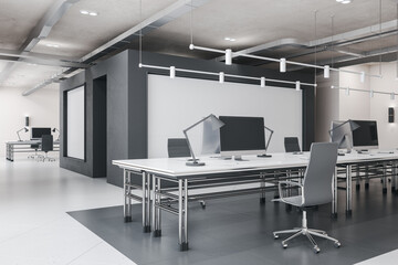 Perspective view on stylish monochrome open space office with modern computers on white work tables, loft ceiling and white and grey walls and floor. 3D rendering