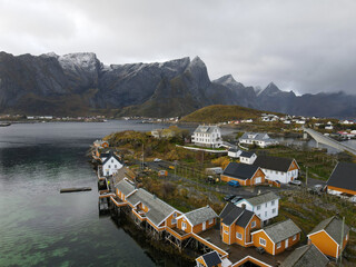 Traditional yellow Rorbuer in fishing village of Sakrisoya in Lofoten Islands in Norway