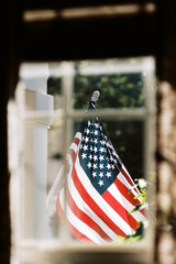 American Flag as Seen from Inside a Window