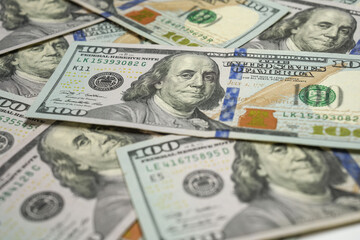 Pile of 100 US dollar bills in detail