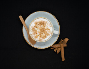 salep drink cafe cup art sahlep,
top view and cinnamon sahlep