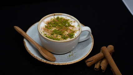 salep drink cafe cup art sahlep,
top view and cinnamon sahlep