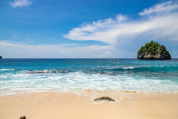 The beautiful sandy beach (Diamond beach) with rocky mountains and clear water in Nusa Penida, Bali, Indonesia