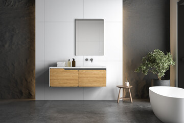 Fototapeta na wymiar Modern bathroom interior with concrete floor, white oval bathtub and white basin, shower, plant. 3D rendering