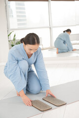 Asian woman folded her palms on sadhu boards. 
