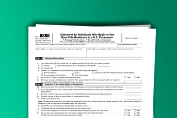 Naklejka premium Form 8898 documentation published IRS USA 10.14.2021. American tax document on colored