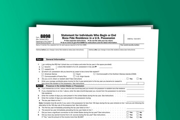 Form 8898 documentation published IRS USA 10.14.2021. American tax document on colored