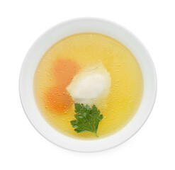 Delicious chicken bouillon with carrot and parsley in bowl on white background, top view