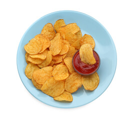 Delicious chips with ketchup isolated on white, top view