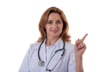 A beautiful young female doctor points her finger up isolated on white background