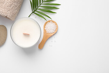 Plakat Flat lay composition with candle and different spa products on white background. Space for text